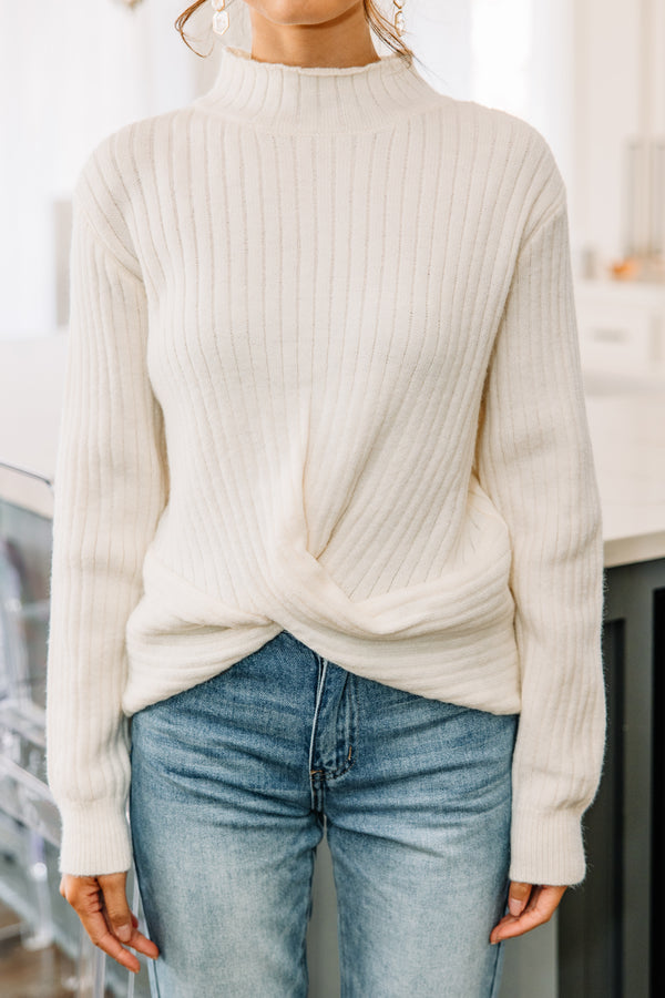 white mock neck sweater