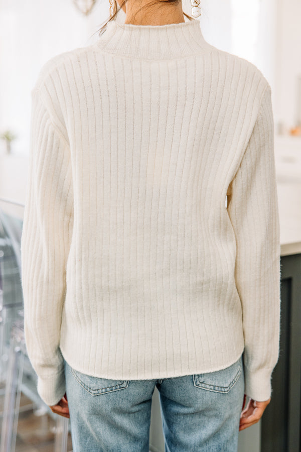 white mock neck sweater