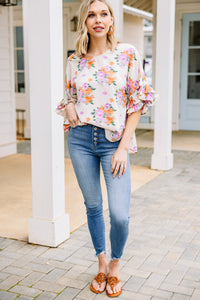 white floral ruffled blouse