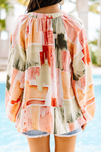 coral and green abstract blouse