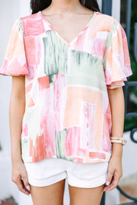 short sleeve sage green and orange abstract print top