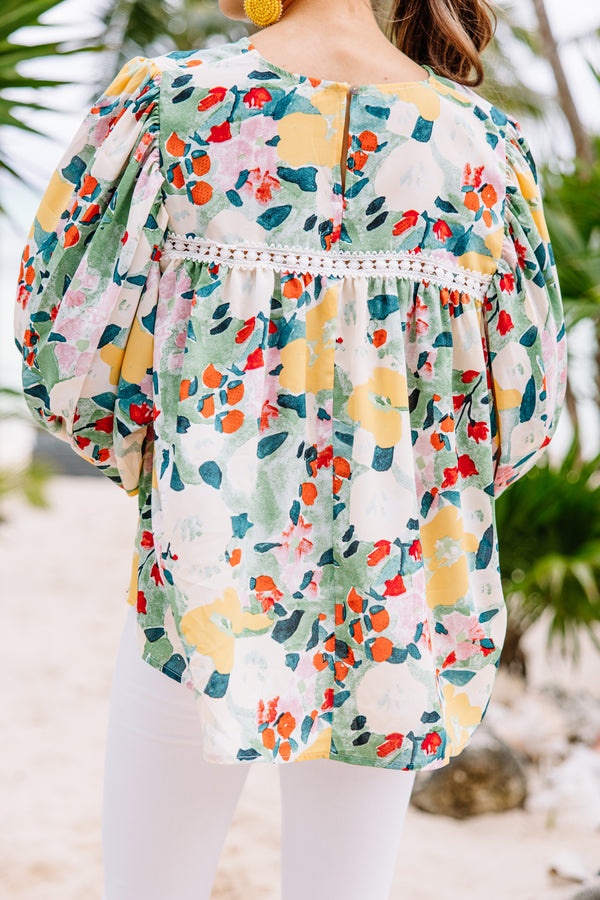 bright floral blouse