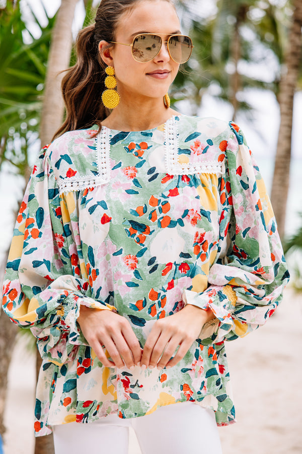 bright floral blouse