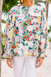 bright floral blouse