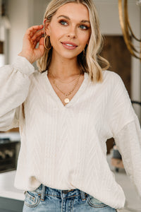 white cable knit top