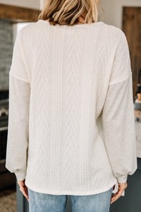 white cable knit top