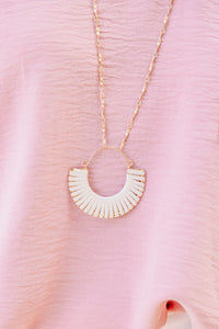 white pendant necklace