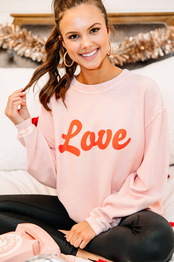 pink corded graphic sweatshirt