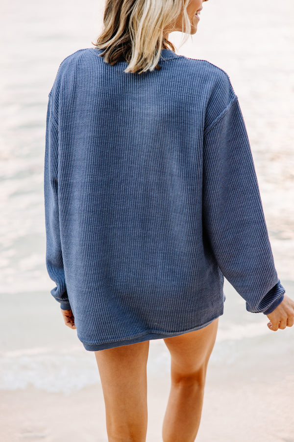 blue embroidered sweatshirt