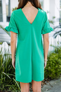 feminine green ruffled dress