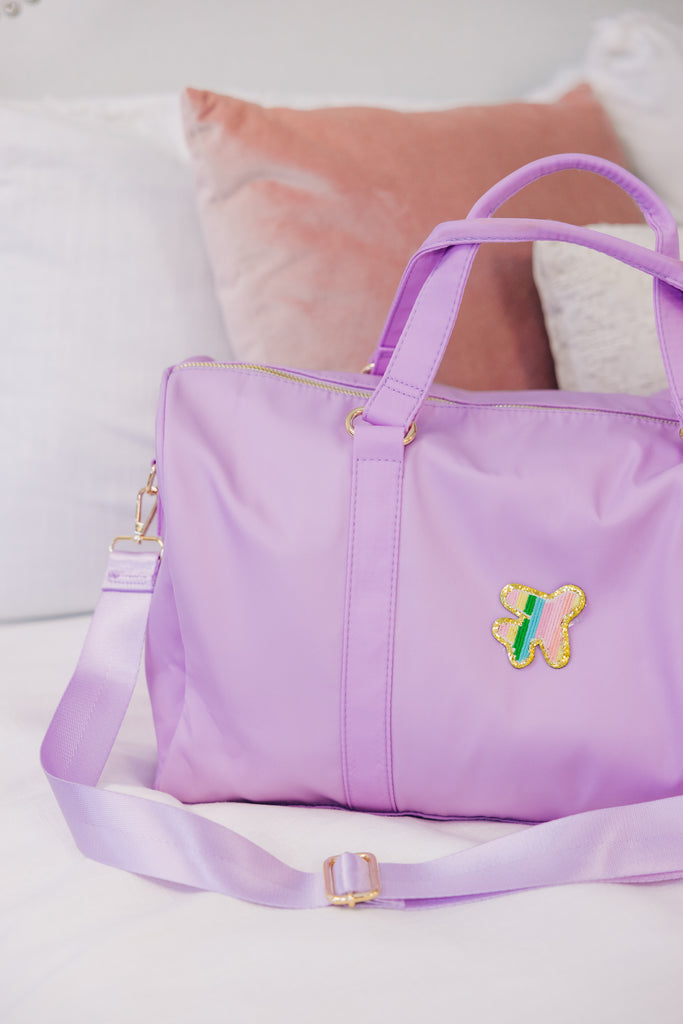 The Getaway Lilac Varsity Duffle Bag – Shop the Mint