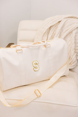 The Getaway Nude Varsity Duffle Bag – Shop the Mint