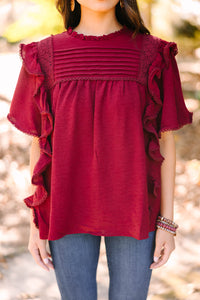 feminine ruffled red blouse