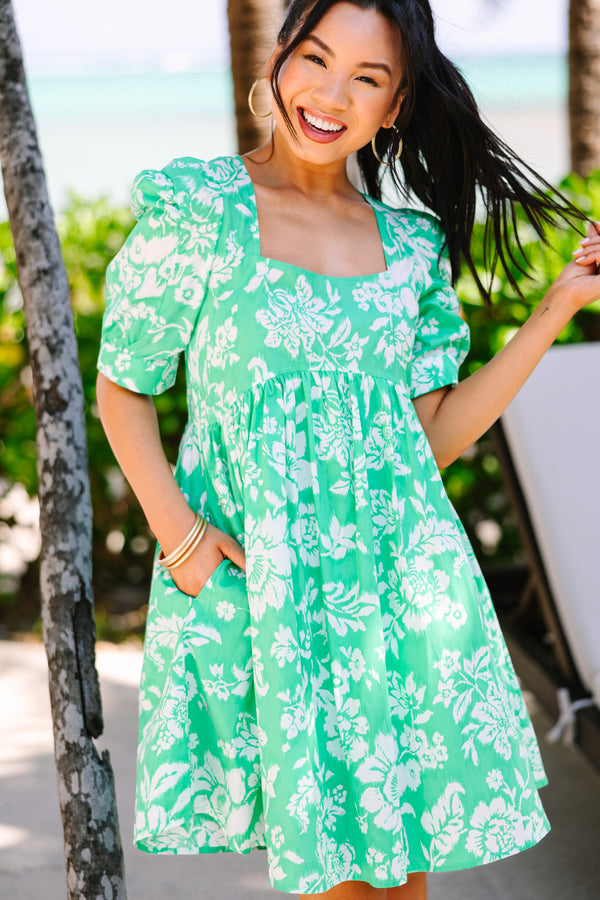 green floral babydoll dress with short puff sleeves