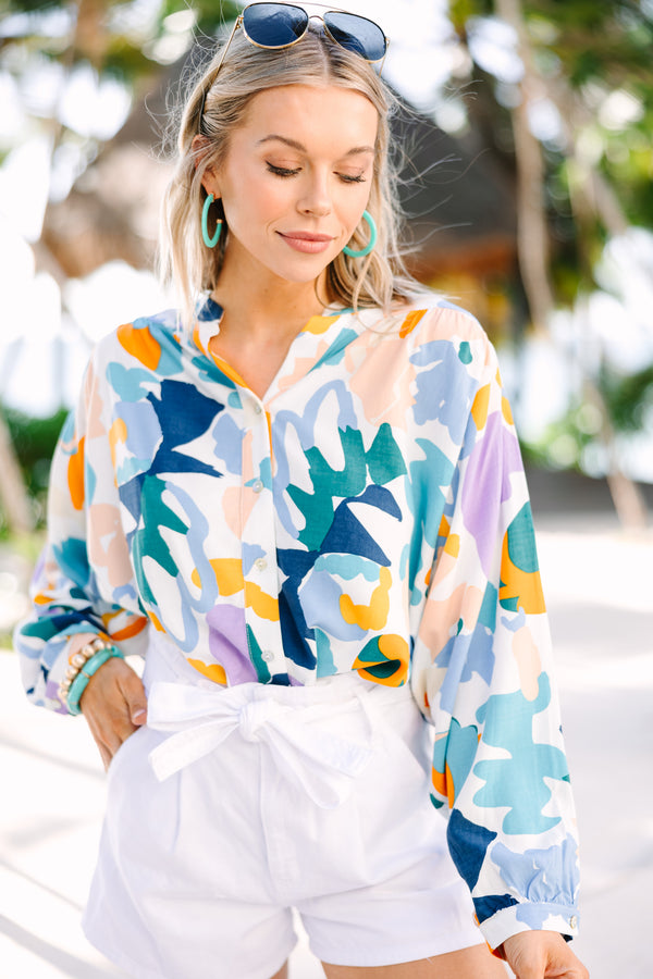 blue abstract print button down top with long sleeves