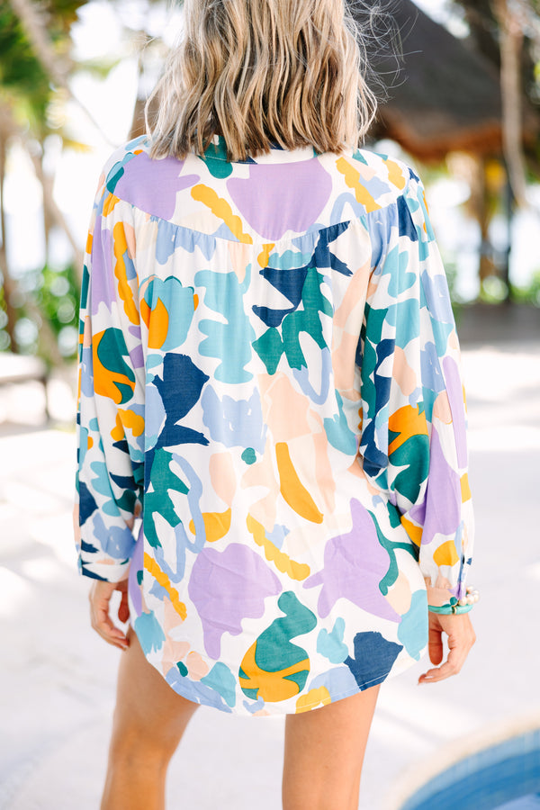 blue abstract print button down top with long sleeves