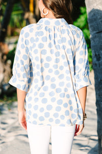 white and blue polka dot blouse
