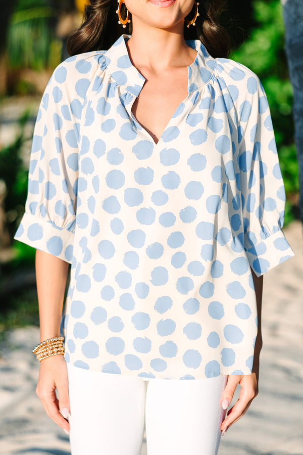 white and blue polka dot blouse
