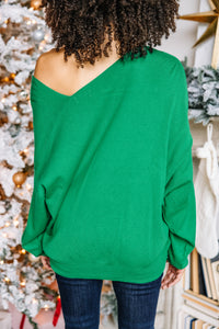 vibrant green sweater