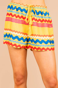 printed shorts, shorts, yellow, tied tassel trim, elastic waistband