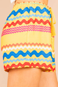 printed shorts, shorts, yellow, tied tassel trim, elastic waistband