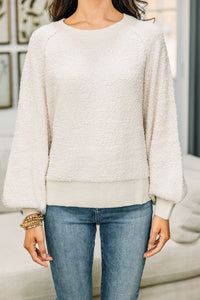 white textured sweater