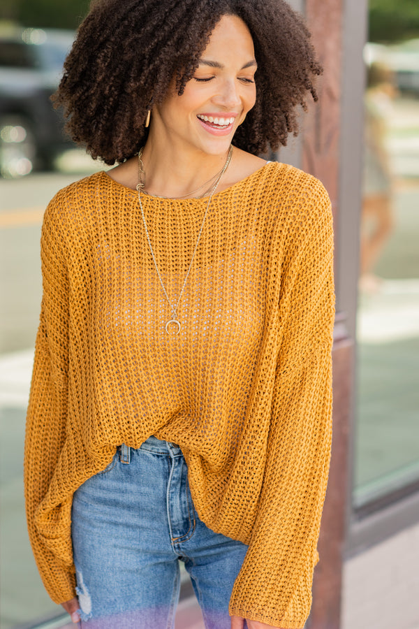 yellow loose knit sweater