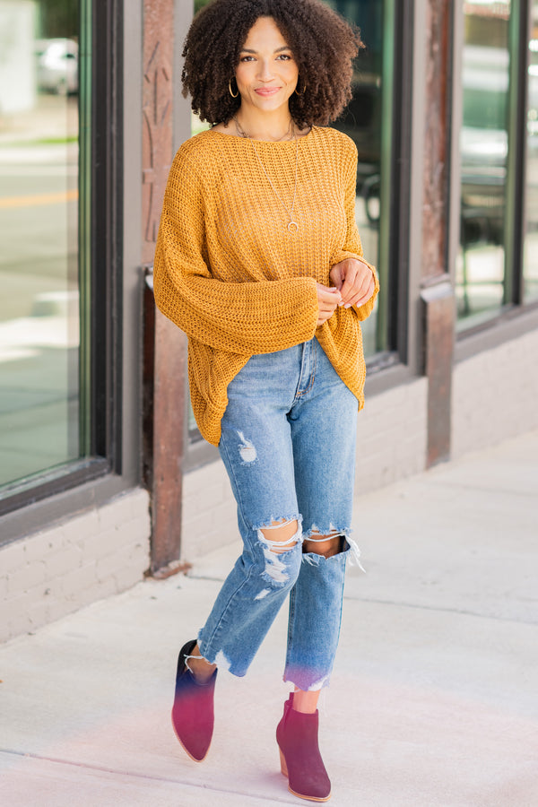yellow loose knit sweater