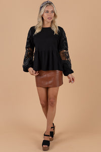 round neckline, long, lace sleeves, a peplum detail