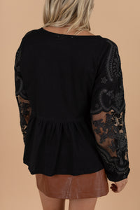 round neckline, long, lace sleeves, a peplum detail