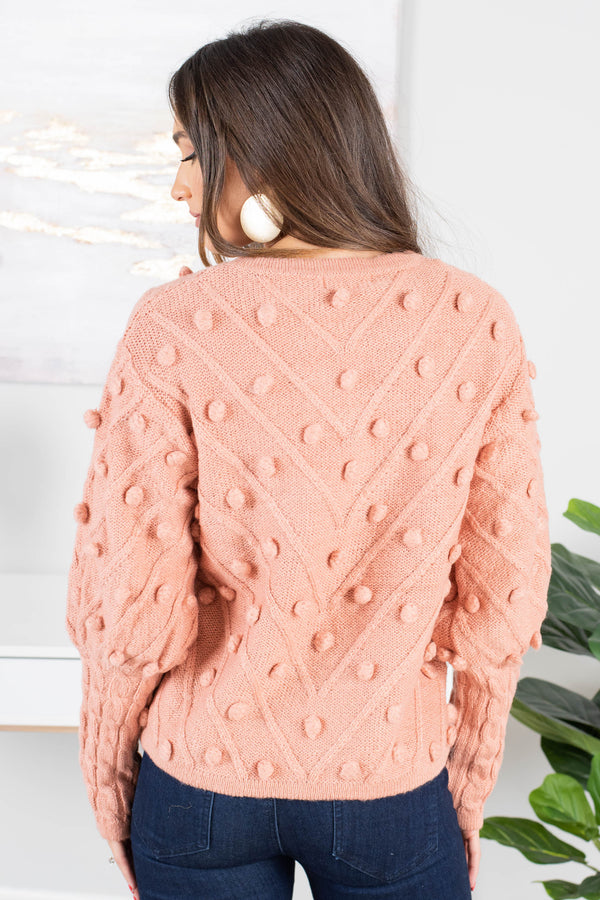 sweater, long bubble sleeves, round neckline, knit fabric, pompom detailing, pink, casual, cozy