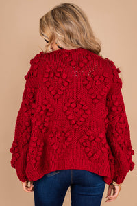 sweater, long sleeves, round neckline, knit fabric, pompoms, red