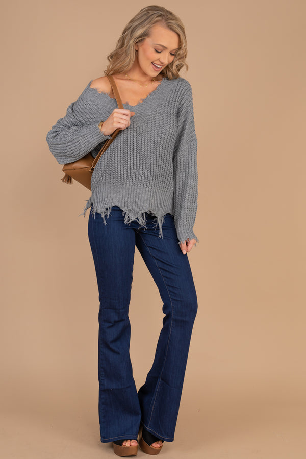 v-neck, long sleeves, knit fabric, distressed trim 