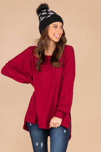 red top, red waffle top, top, waffle knit fabric, long sleeves, split sides, round neckline, high low hem, layer, casual