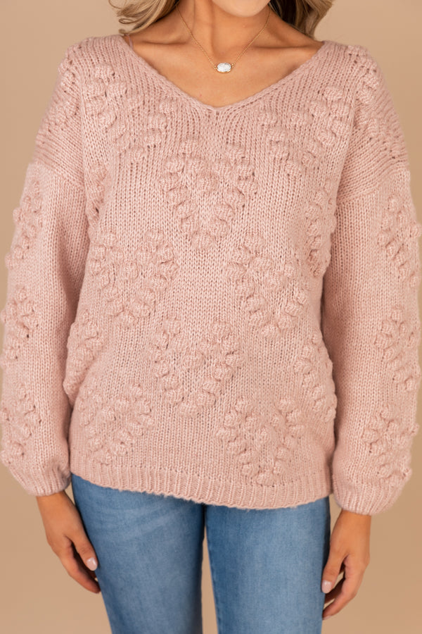 pink sweater, sweater, v-neckline, long sleeves, knit fabric, pompoms