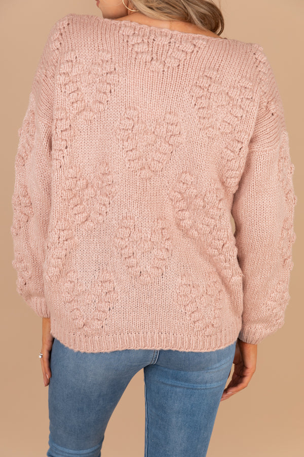 pink sweater, sweater, v-neckline, long sleeves, knit fabric, pompoms