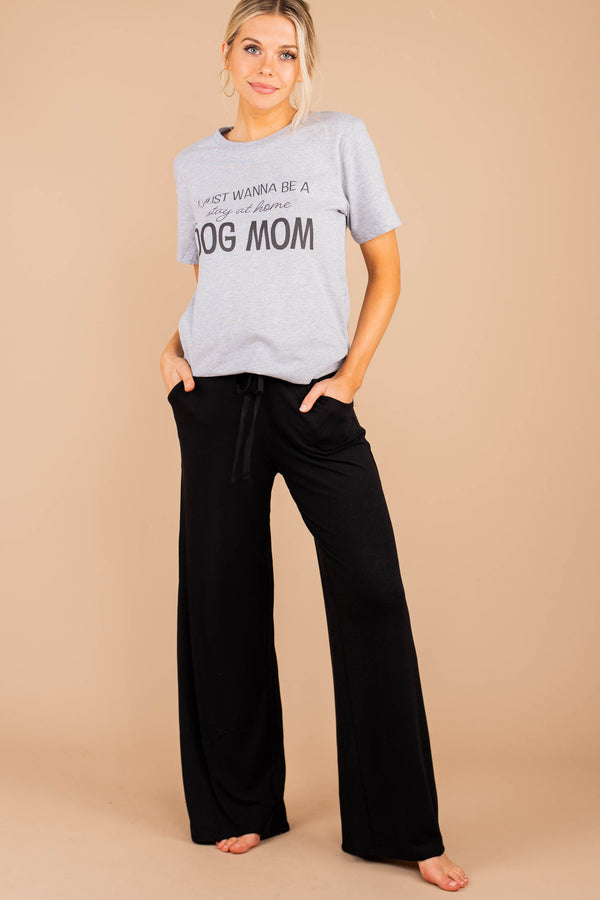 soft stretch fabric, pants, black pants, tied front waist, pockets, wide leg hem, palazzo pants