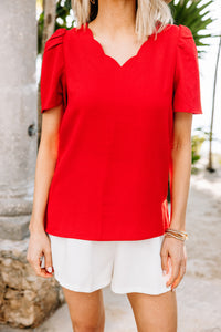 bright red blouse