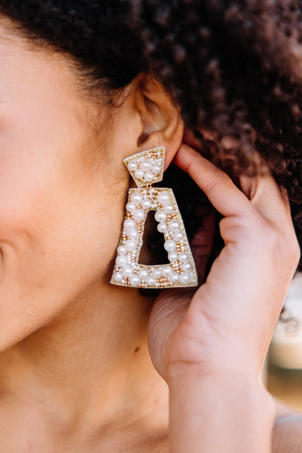 pearl studded earrings