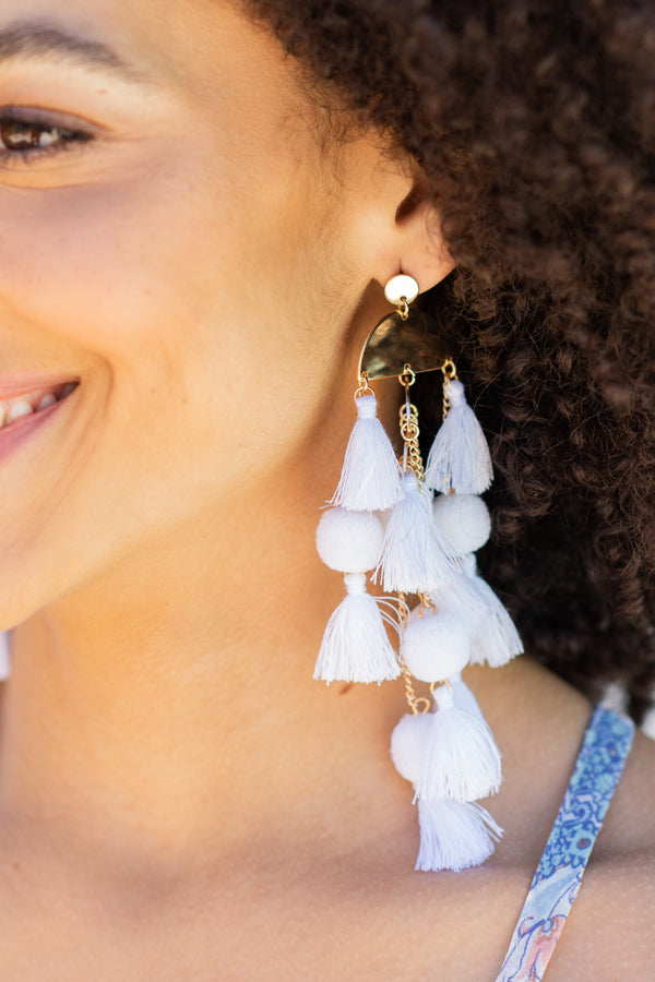 bold white tassel earrings